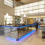 Отель Silken Puerta 4*